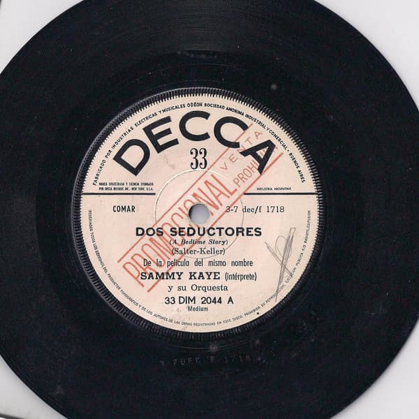 Sammy Kaye y su Orquesta — Dos Seductores (A Bedtime Story) / Tren Nocturno (Night Train)