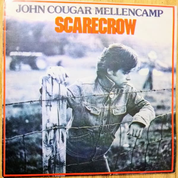 John Cougar Mellencamp — Scarecrow = Espantapájaros