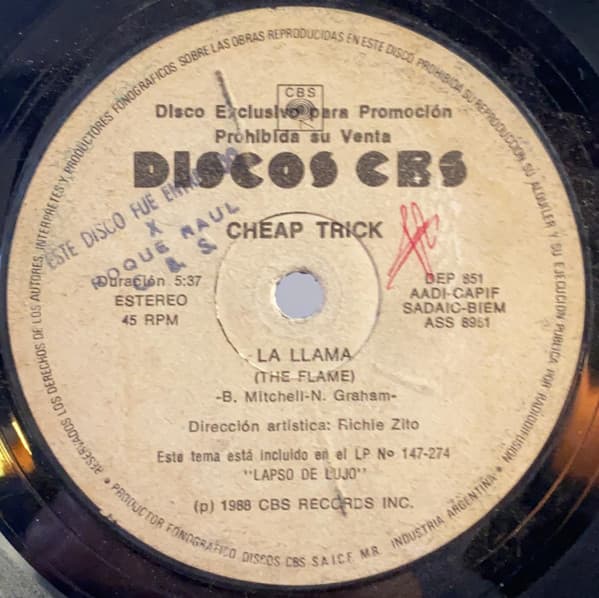 Cheap Trick — La Llama = The Flame / No Seas Cruel = Don't Be Cruel