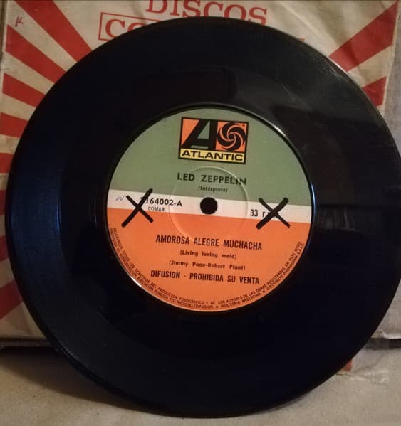 Led Zeppelin — Amorosa Alegre Muchacha = Living Loving Maid / Un Montón de Amor = Whole Lotta Love