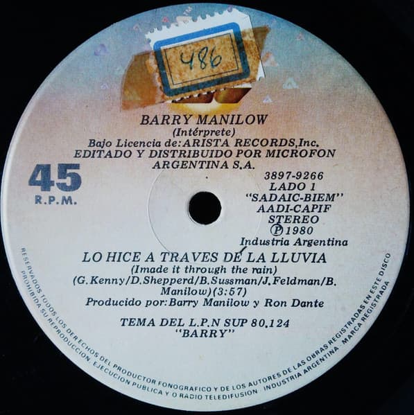 Barry Manilow — Lo Hice A Travez de la Lluvia = I Made It Through The Rain / Solamente En Chicago = Only In Chicago