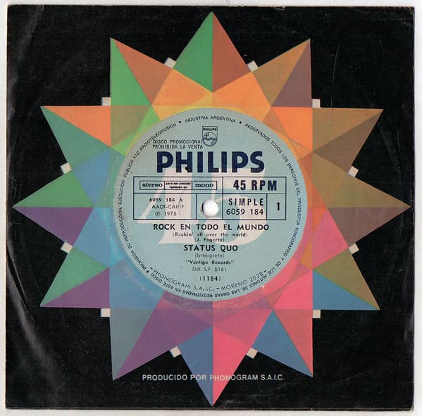 Status Quo — Rock Alrededor Del Mundo = Rockin' All Over The World / Llama Por Un Cambio = Ring Of A Chenge