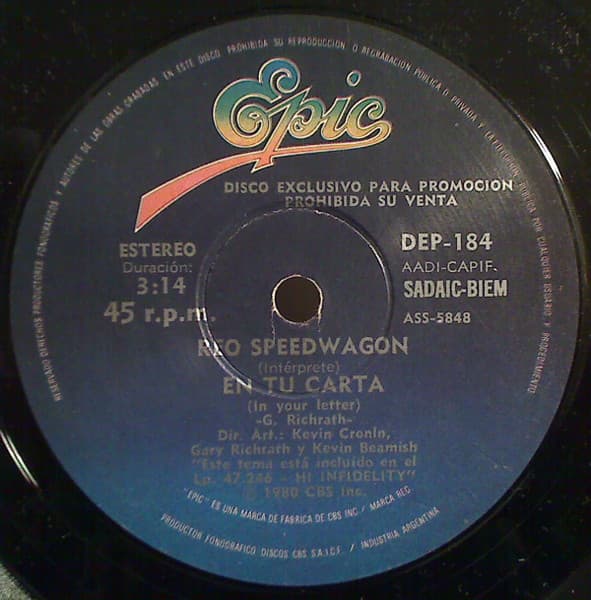 REO Speedwagon — En Tu Carta = In Your Letter / Muneco Duro = Tough Guys