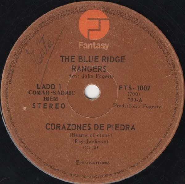 The Blue Ridge Rangers — Corazones De Piedra = Hearts Of Stone / Deseando En Algun Lugar Escuchar Mi Nombre = Somewhere Listening (For My Name)