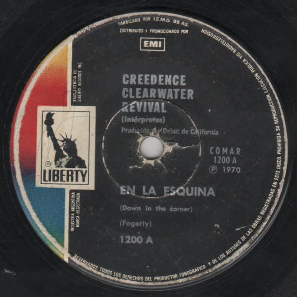 Creedence Clearwater Revival — En La Esquina = Down In The Corner / Hijo Afortunado = Fortunate Son