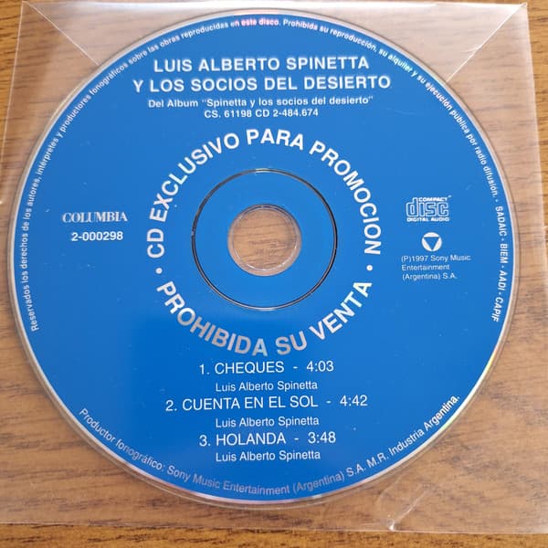 Spinetta Y Los Socios Del Desierto — Cheques