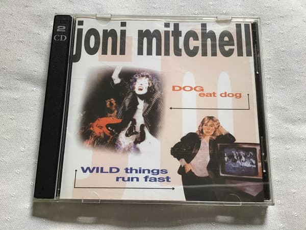 Joni Mitchell — Dog Eat Dog / Wild Things Run Fast