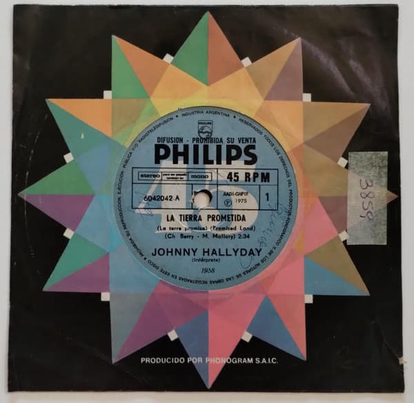 Johnny Hallyday — La Tierra Prometida = La Terre Promise / La Primera Vez = La Première Fois